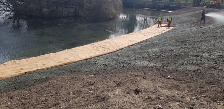 Caerphilly Castle hessian matting being laid